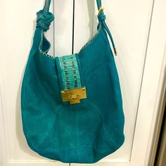 Reposhing This Item I Purchased From @Laurenrosen30. Loved It, But Ready To Rotate For Something New. Questions? Leave A Comment Below! There Are Some Stains On The Bag That Were There When Purchased. If You Need Photos, Please Let Me Know. Elegant Turquoise Shoulder Bag, Turquoise Bohemian Shoulder Bag, Green Leather Hobo Bag With Gold-tone Hardware, Turquoise Shoulder Bag For On-the-go, Blue Bucket-shaped Hobo Bag With Removable Pouch, Jimmy Choo Bag, Hobo Bag, Jimmy Choo, Bag Lady