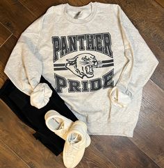 Panther Pride ash crew -Wash shirt inside out, no fabric softener and tumble dry. **There are no returns!! -Once the shirt is out of my hands and with the USPS you will need to contact USPS regarding your order. If the item is lost, you will need to contact USPS and file a claim with them. There are times where a certain shirt color is sold out and i am unable to get it, if this happens, I will message you. We can either choose a different shirt color, wait until it gets back in stock or i can r School Football Shirts Design, Booster Club Merchandise, Middle School Spirit Wear, School Homecoming Shirts, School Spirit Apparel, High School Staff Shirts, Panther Pride Shirt School Spirit, Cute School Shirt Designs, Mascot Tshirt Designs