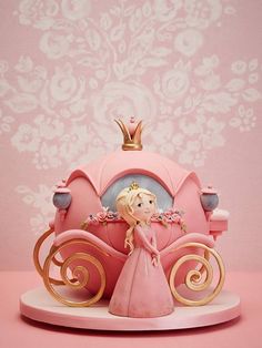 an image of a cake with a princess in the carriage on it's facebook page