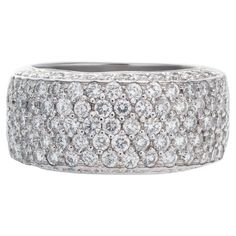 Sparkling bright micro pave diamond ring with approxikmately 1.5 carats in round cut brilliant diamonds set in a wide band of 18k white gold. Ring width 9.8mm. Size: 6.5. This Diamond ring is currently size 6.5 and some items can be sized up or down, please ask! It weighs 7.4 gramms and is 18k White Gold. Pave Setting Ring, Micro Pave Ring, Expensive Jewelry Luxury, Diamond Ring Set, Pave Diamond Ring, Diamond Ring Settings, Expensive Jewelry, Pave Ring, Fabulous Jewelry