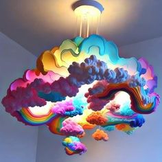 a multicolored cloud chandelier hanging from the ceiling