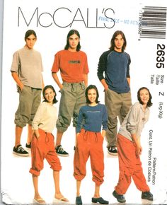 a group of young people standing next to each other in front of a magazine cover