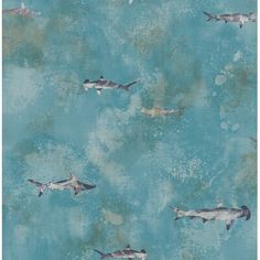 a blue background with sharks swimming in the water