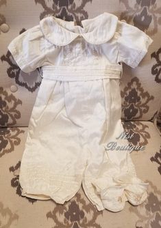 "★.**'Ivory Color 4 pieces Baby Boy Christening Outfit★'.★ It is perfect for both baptism or blessing Comes with: ★Jumper ★Sash ★Hat ★Shoes 4\" Measurements 3-6 months, Jumper (waist 9\", long 22\") Please check the measurements, and any questions send me a message, your satisfaction is very important for me Comes with a suit bag Dry clean only" Off White Baptism Dress For Summer, Elegant Baptism Dress In Solid Color, Fitted Beige Baptism Dress, Elegant Baptism Dress, First Communion Cream Baptism Dress, Classic Cream Baptism Dress, Cream Sets For Baptism In Summer, Classic Cream Baptism Clothing Set, Classic Cream Sets For Baptism