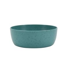 a blue bowl with speckles on the rim, sitting in front of a white background