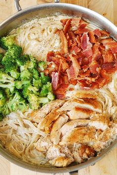 the meal is prepared and ready to be eaten in the pan on the table with utensils