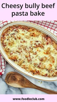 a cheesy beef pasta bake in a casserole dish