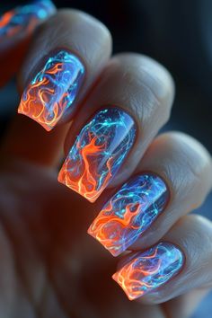 Ignite your nails with neon flames. Bold and fiery, this electrifying design is sure to command attention and add a dose of fierce energy to your look. Click for more! Neon Flames, Neon Nail Art, Glow Nails, Angry Bird, Neon Nails, Christmas Nail Designs, Classy Nails, Funky Nails, Nail Art Inspiration