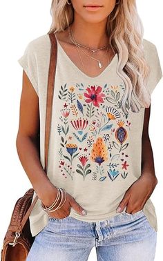 PRICES MAY VARY. Women's Lotus Floral Tank Tops Casual Summer Sleeveless Wildflowers Floral Graphic Tees Tops Design:Women's Vintage Flowers Shirt Casual Boho Cottagecore Pastel Botanical Floral Printed T-Shirt Wildflowers Graphic Tees. Unique and cute design, daisy, dandelion, sunflowe, wildflower decorations, cute aesthetic tops. Short sleeves, cool and fashionable. Flower shirts for women is simple but energetic, show your charm. Occasion: This flower top is very suitable for any occasion, es Boho Shirts For Women, Cute Aesthetic Tops, Wildflower Decorations, Cottagecore Pastel, Aesthetic Tops, Pastel Botanical, Over 40 Outfits, Vintage Flower Prints, Summer Cap