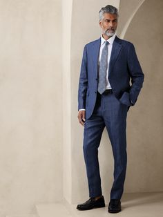 Greet every occasion with the fresh, beautiful texture of this lightweight linen pant, a naturally breathable fabrication seen here in a tailored slim fit with subtle dimension from a herringbone weave.  TAILORED SLIM FIT: Mid-rise.  Tapered through the leg, with a slim leg opening and distinctive break at the hem.  Zip fly with button closure.  Belt loops.  Front and back pockets.  Lined to the knee.  Tailored slim fit: More at-ease than our Slim Fit, with a tapered leg and distinctive break at Business Casual Attire For Men, Interview Suits, Navy Suit Wedding, Linen Pants Suit, Semi Formal Attire, Party Jackets, Linen Pant, Tuxedo Blazer, Guest Attire