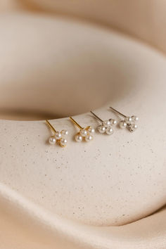 Discover our Coquette Charm collection. 💫🌿 Dainty Silver Cluster Earrings For Wedding, Silver Dainty Cluster Earrings For Wedding, Minimalist Pearl White Wedding Earrings, Minimalist Single Earring For Wedding, Dainty Single Pearl Earring For Wedding, Dainty Pearl White Bridal Earrings For Wedding, Minimalist Pearl White Bridal Earrings For Wedding, Wedding Accessories For Bride, Charm Collection