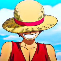 a woman wearing a straw hat and red shirt with blue sky in the background,