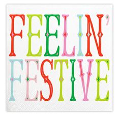 a paper napkin with the words feelin'festive in multicolored letters