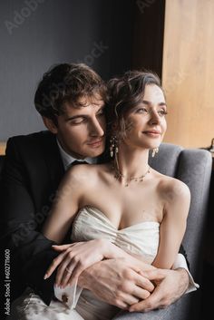 a man and woman sitting next to each other