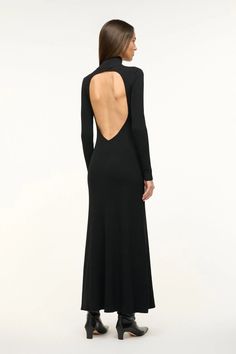 The Obsidian Dress from Staud is perfect for making an entrance. This stunning black maxi dress features a bold open back. The high neckline and long sleeves balance the daring back cutout, offering an unexpected twist to a classic silhouette. Fancy Date Night, Designer Hair Accessories, Cotton Poplin Dress, Dress With Long Sleeves, Poplin Dress, Black Maxi, Classic Silhouette, Event Dresses, Casual Elegance