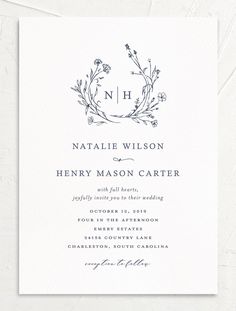 an elegant wedding card with the letter n on it