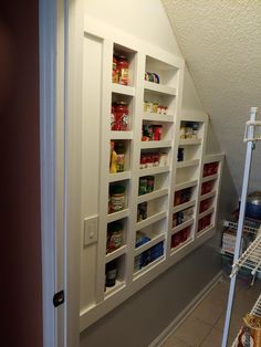 the pantry is organized and ready to be used as a storage area for food items