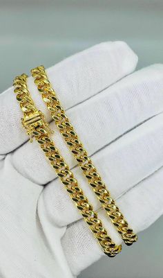 Texas Jewelers Is Presenting You with This Absolutely Stunning Real 14k Pure Yellow Gold Royal Miami Cuban Link Chain 6mm, 22" Inches Long Necklace. The links are 14K PURE GOLD and have a Lobster lock on chain. These Beautiful chain will not tarnish, discolor, or fade because they are Pure 14k Yellow Gold. All our item is hand designed in Grapevine Texas USA. Metal Purity: 14k Pure Yellow Gold  Weight: (21-25) Grams (Approx) Length: 22" inch Long Width of Chain: 6 mm (Approx.) Lock Type: Box Lock Condition:Brand New Gender: Unisex                                                                                                The weight are only approximate and might be slightly different. Shipping: So sorry we don't ship out item out of USA. Items will be shipped via United States Postal Se Grapevine Texas, Miami Cuban Link Chain, Miami Cuban, Texas Usa, Necklace Box, Cuban Link Chain, Cuban Chain, Cuban Link, Pure Gold