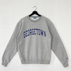 Vintage University Wisconsin Sweatshirt Wisconsin Crewneck University Wisconsin Sweater Pullover Wisconsin Badgers Embroidered Logo XLarge 𝐁𝐫𝐚𝐧𝐝 :- Georgetown University  𝐒𝐢𝐳𝐞 𝐓𝐚𝐠 :- Medium Manual Measurement :- 𝐖𝐈𝐃𝐓𝐇 (armpit to armpit) :- 21.5 inches / 55cm 𝐋𝐄𝐍𝐆𝐓𝐇 (shoulder to end of garment) :- 26 inches / 66cm 𝐂𝐨𝐧𝐝𝐢𝐭𝐢𝐨𝐧 :- Good Condition 8/10.                      - Minor Defect Stain Refer Picture. - Colors Might Be Different Due To Lighting. - All items are V Gray Long Sleeve College Sweater, Gray Long Sleeve Sweater For College, Collegiate Crew Top For Winter, Gray Collegiate Long Sleeve Sweatshirt, Crew Neck College Sweatshirt For Winter, College Winter Crew Neck Sweatshirt, Winter College Crew Neck Sweatshirt, Crew Neck Sweater For College In Winter, Collegiate Gray Crew Neck Top