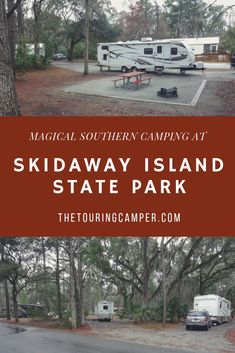 an rv park with trees and cars parked in the parking lot next to it is a sign that says, skidaway island state park