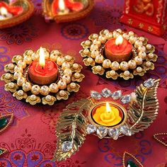 small candles are sitting on a table