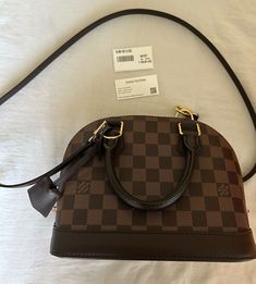 Gently used- purchased in 2023 Includes- -Non adjustable LV strap- strap has minor glazing defect, -QR code for authentication, - original dust bag, box, and LV lock Damier Ebene, Brown Canvas, Qr Code, Bags Handbags, Dust Bag, Shoe Accessories, Louis Vuitton, Bag Lady, Women Accessories