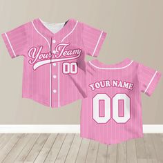 - Premium Material: Our Baseball Jerseys for women men are made from lightweight polyester, boxed flatback mesh fabric offers outstanding durability, insulation, and wrinkle resistance, which provide our customers with a great put-on experience. The elegant workmanship ensures the custom baseball jerseys fits your body excellently. - Customized Baseball Jersey: Let's create your own design with our personalized baseball jersey. Select the desired size and color, then enter the name and number. Please read the size information for choose your own size. - Suitable for any occasion: Straight-fit Baseball Jerseys are prepared with full button sown closures. Our baseball jerseys can be worn on a variety of situations, including hanging out with friends, attending athletic events, or even as cus Casual Pink Baseball Jersey For Sports, Ballet Shirts, Grad Shirts, Jersey Uniform, Jersey Baseball, Baseball Uniforms, Custom Baseball Jersey, Kids Baseball, Baseball Fan