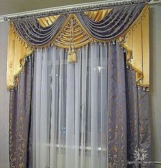 the curtains are hanging in front of the window