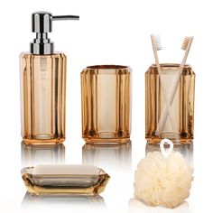 three different types of bathroom accessories including soap dispenser, toothbrush holder and soap dish