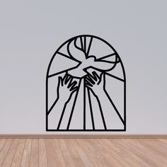 a wall mounted art piece depicting the hands of jesus and mary in front of a window