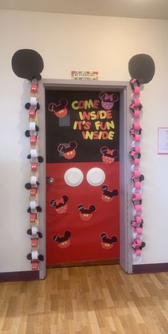 a door decorated with mickey mouse decorations