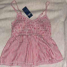 Brand New Never Worn Hollister Tank Red Fitted Tank Top For Vacation, Fitted Red Tank Top For Vacation, Casual Red V-neck Tank Top, Red Casual Tank Top For Summer, Casual Red Tops For Spring, Casual Striped Tops For Vacation, Red Tank Top For Spring, Red Tank Top For Spring Vacation, Red Tank Top For Spring And Summer