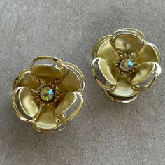 Vintage Floral Clip on earrings  Gold tone metal  Please See Pictures for size and details  Free Gift wrapping upon request Free Shipping on orders over $35 (Domestic) For more treasures please visit: https://www.GlowingEmpire.com Gold Clip-on Flower-shaped Earrings, Gold Clip-on Earrings In Flower Shape, Gold Flower Earrings For Formal Events, Gold Clip-on Flower Shaped Jewelry, Party Jewelry With Gold Flower Decoration, Gold Jewelry With Flower Decoration For Parties, Gold Flower-shaped Clip-on Earrings For Party, Gold Metal Flower Earrings For Party, Gold Flower Shape Clip-on Earrings For Party