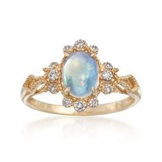 Opal and Diamond Accented Ring in 14kt Yellow Gold Accented Ring, Sky Blue Topaz Ring, Opal Drop Earrings, Opal Birthstone, Blue Topaz Engagement Ring, Blue Topaz Bracelet, Diamond Accent Ring, Opal Pendant Necklace, Topaz Engagement Ring