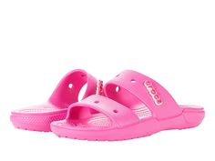 Crocs Classic Sandal - Shoes : Electric Pink : Versatile, customizable, and guaranteed to offer you all day comfort, The Crocs Classic Sandal is lightweight, fun to wear and offers holes for Jibbitz charms! Slip right into your new favorite seasonal must-haves! Original Croslite foam cushion will keep you comfortable and supported no matter your daily activity. Iconic Crocs Comfort offers lightweight and flexible 360-degree comfort. Easily cleanable and quick dry. Perforated design is customizab Crocs Logo, Pink Crocs, Crocs Sandals, Daily Activity, Sandal Shoes, Shoes Sandals, Charms, Slip On, Sandals