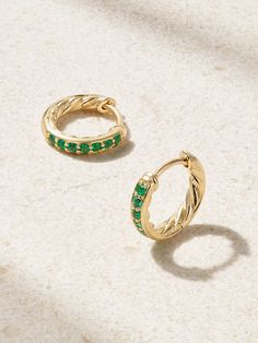 David Yurman's 18-karat gold earrings are part of the 'Petite Pavé' collection, which captures the vibrant colors and energy of New York City at night. Designed in a dainty, huggy hoop silhouette, they're traced with a row of emeralds along the front and backed in the brand's iconic ‘Cable’ motif. Make them a part of your daily stack. Gold Plated Yellow Gold Hoop Earrings With Gemstone, Yellow Gold Emerald Huggie Earrings, Green Small Hoop Huggie Earrings Fine Jewelry, Green Huggie Fine Jewelry Earrings, Green Huggie Earrings Fine Jewelry, Green Small Hoop Huggie Earrings, Gold Emerald Huggie Earrings, Yellow Gold Gemstone Huggie Earrings, Elegant Green 14k Gold Huggie Earrings