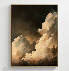 a painting hanging on the wall in front of a white wall with a wooden frame