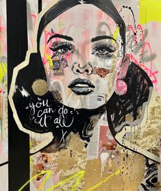 a woman's face is covered in graffiti and has headphones on her ears