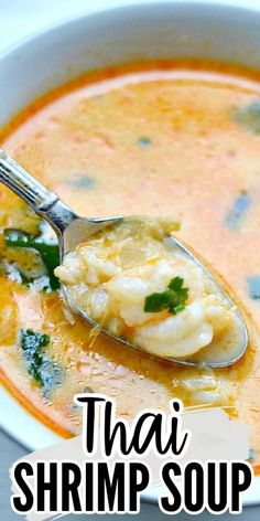 thai shrimp soup in a white bowl with a spoon and the words thai shrimp soup on it