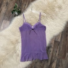 Victoria's Secret Chemise Slip Dress Size Large Purple, Sheer, Mesh, Ruffled Hem, Adjustable Straps, Center Bow New With Tags 91% Nylon, 9% Spandex Length: 26.5" Bust: 33" Pet Friendly Home. I Live With A Smoker. My Items Are Laundered/Cleaned (Except Nwt Or Nwot), Sometimes Using Scented Laundry/Cleaning Products. Feminine Fitted Nightgown With Ruffles, Fitted Feminine Ruffled Nightgown, Victoria's Secret Lace Trim Camisole For Daywear, Victoria's Secret Spring Sleepwear With Ruffles, Spring Victoria's Secret Sleepwear With Ruffles, Victoria's Secret Fitted Camisole Nightgown, Victoria's Secret Sleeveless Coquette Top, Victoria's Secret Feminine Fitted Nightgown, Flirty Sleeveless Sleepwear With Lace Trim