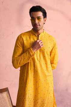 SHRESTHA By VASTRAMAY Men's Yellow Georgette Zari With Sequins Worked Kurta pant Set Elevate your traditional wardrobe with the exquisite SHRESTHA By VASTRAMAY Men's Yellow Georgette Zari With Sequins Worked Kurta Pant Set. Crafted with meticulous detail, this set combines classic elegance with contemporary style, perfect for festive occasions and special events. Features Elegant yellow georgette fabric Intricate zari and sequins work Comfortable fit with stylish design Ideal for festive and special occasions Specifications Brand: SHRESTHA By VASTRAMAY Color: Yellow Fabric: Georgette Work: Zari with sequins Set Content: Kurta and Pant Material & Care Material: Georgette Care: Dry clean only to maintain the intricate work and fabric quality Legal Disclaimer: The product is guaranteed to be Traditional Wardrobe, Kurta Pant Set, Kurta With Pants, Georgette Fabric, Sleeveless Jacket, Yellow Fabric, Full Sleeves, Pant Set, Mandarin Collar