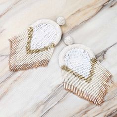 IG: @jaunt_world Artisan White Earrings With Beaded Fringe, Gold Elegant Beaded Earrings With Large Beads, Elegant Gold Beaded Earrings With Large Beads, Elegant Large Beads Drop Earrings, White Round Earrings With Gold Beads, Elegant Dangle Beaded Earrings With Large Beads, Bohemian White Beaded Earrings, Elegant Large Beaded Dangle Earrings, Elegant Large Beaded Drop Earrings