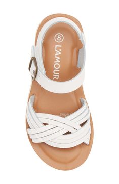 Memory foam cushioning brings comfort with every step they take in this go-anywhere leather sandal shaped with wavy woven straps. Leather upper/synthetic lining and sole Imported White Slip-on Footbed Sandals With Arch Support, White Low-top Sport Sandals With Cushioned Footbed, White Adjustable T-strap Sandals With Cushioned Footbed, Foam Cushions, Leather Sandals, Memory Foam, Leather Upper, Nordstrom, Bring It On