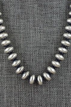 This sterling silver Navajo pearl necklace was made by Navajo silversmith Bryannen Halwood. Necklace: 18" Bead size: 5/16" x 7/16" (8mm x 10mm) Free shipping on all orders! We ship with USPS and always include tracking. All orders ship within a day of payment. Returns are accepted up to 30 days after you receive your order. Just send us a message. Our shop offers cash back or store credit. The item must be returned in new condition. Native American Jewelry, Free Jewelry, Pearl Necklace, Jewelry Necklaces, Sterling Silver, Beads, Free Shipping, Unique Jewelry, Silver