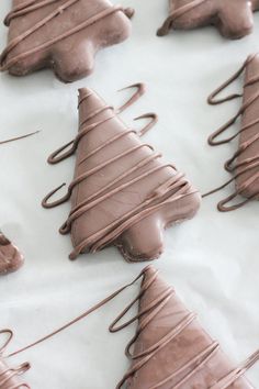 chocolate christmas trees are arranged on top of each other