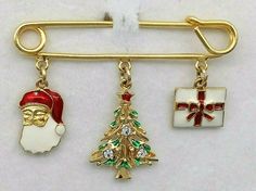 Vintage Christmas Charm Brooch Safety Pin Santa Tree Rhinestones Gold Tone Avon #Avon #Christmas Safety Pin Design, Avon Christmas, The Santa Claus, Santa Tree, Pin Design, Christmas Charms, Pocket Book, Safety Pin, Clear Rhinestones