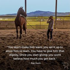 a woman standing next to a brown horse on top of a dirt covered field with a quote from ray hunt