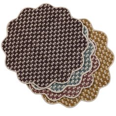 three placemats in different colors and patterns