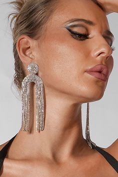 Enhance your elegance with the gemstone-studded Geometric U Jellyfish Inspired Tassel Earrings, a glamorous accessory that effortlessly adds sophistication to your outfit. Featuring intricate geometric patterns and graceful tassel detailing, these earrings will enhance your glamour and appeal. Whether you're attending a chic beach party, a stylish cocktail party, or any special occasion that calls for a unique and alluring accessory, these earrings are the perfect choice. Long Drop Tassel Earrings For Party, Long Drop Metal Tassel Earrings For Party, Elegant Metal Tassel Drop Earrings, Trendy Crystal Earrings For Evening, Elegant Metal Dangle Tassel Earrings, Trendy Evening Crystal Earrings, Elegant Silver Tassel Earrings For Evening, Silver Elegant Tassel Drop Earrings, Crystal Long Drop Chandelier Earrings