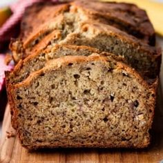 slices of banana bread sitting on top of a cutting board